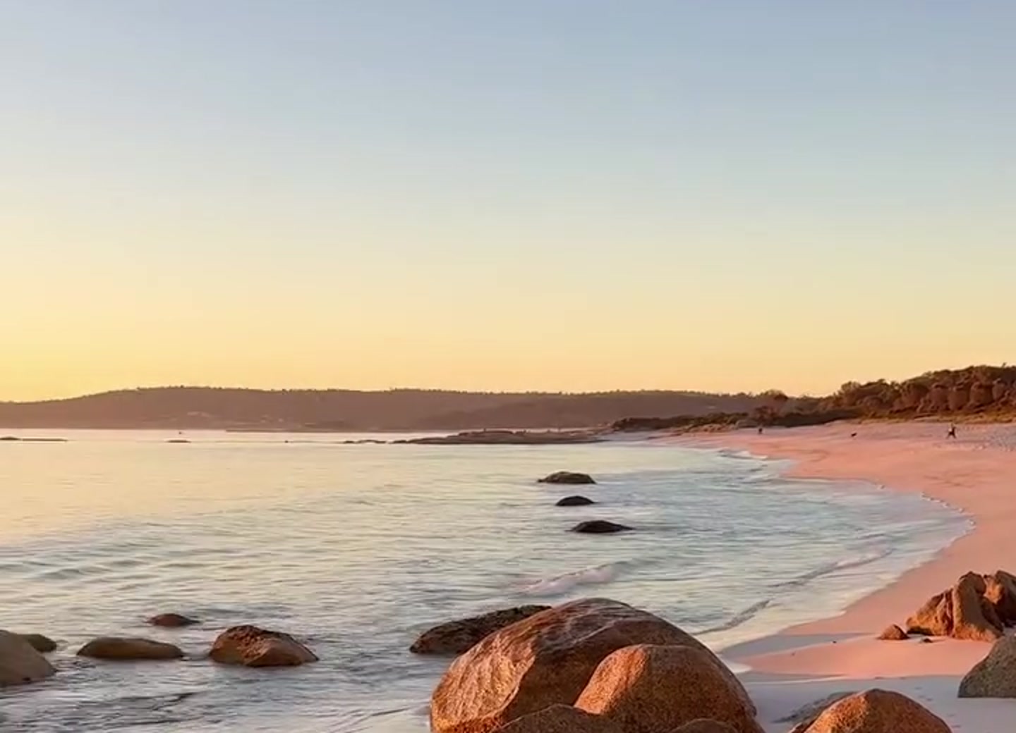 White sand, water and granite rocks along the Bay of Fires