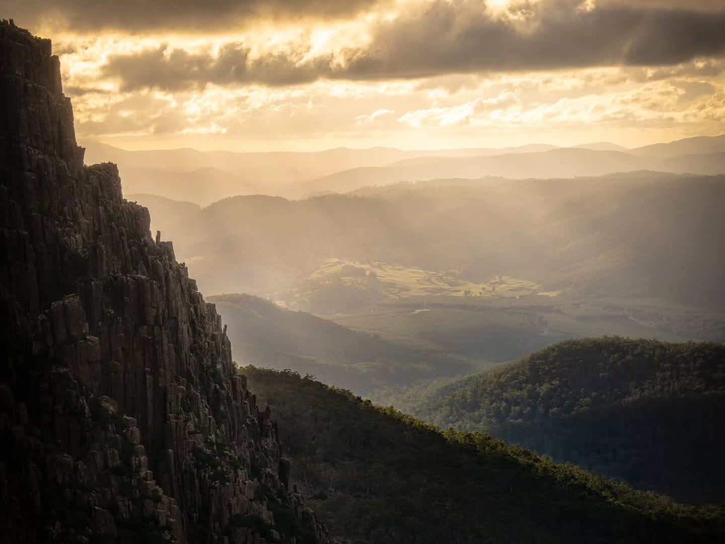 Dolerite cliffs and distant valleys in Ben Lomond National Park