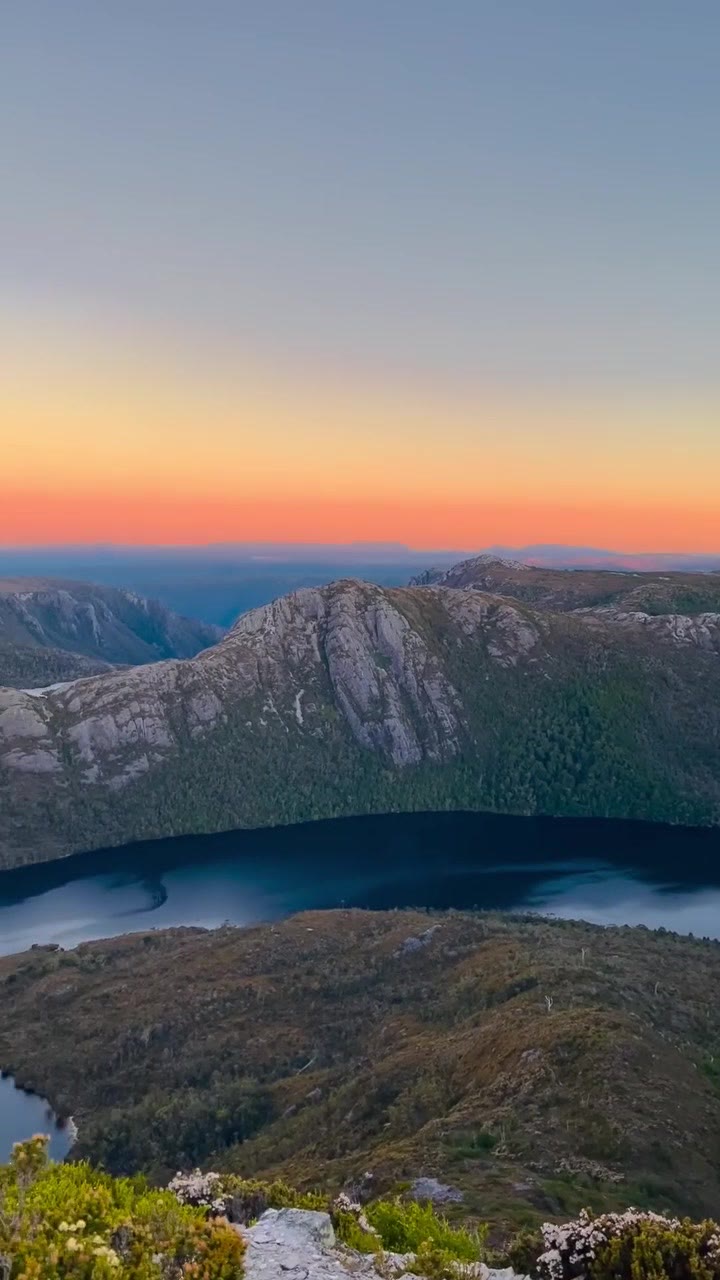 Alpine lake and ridges near Cradle Mountain at dusk