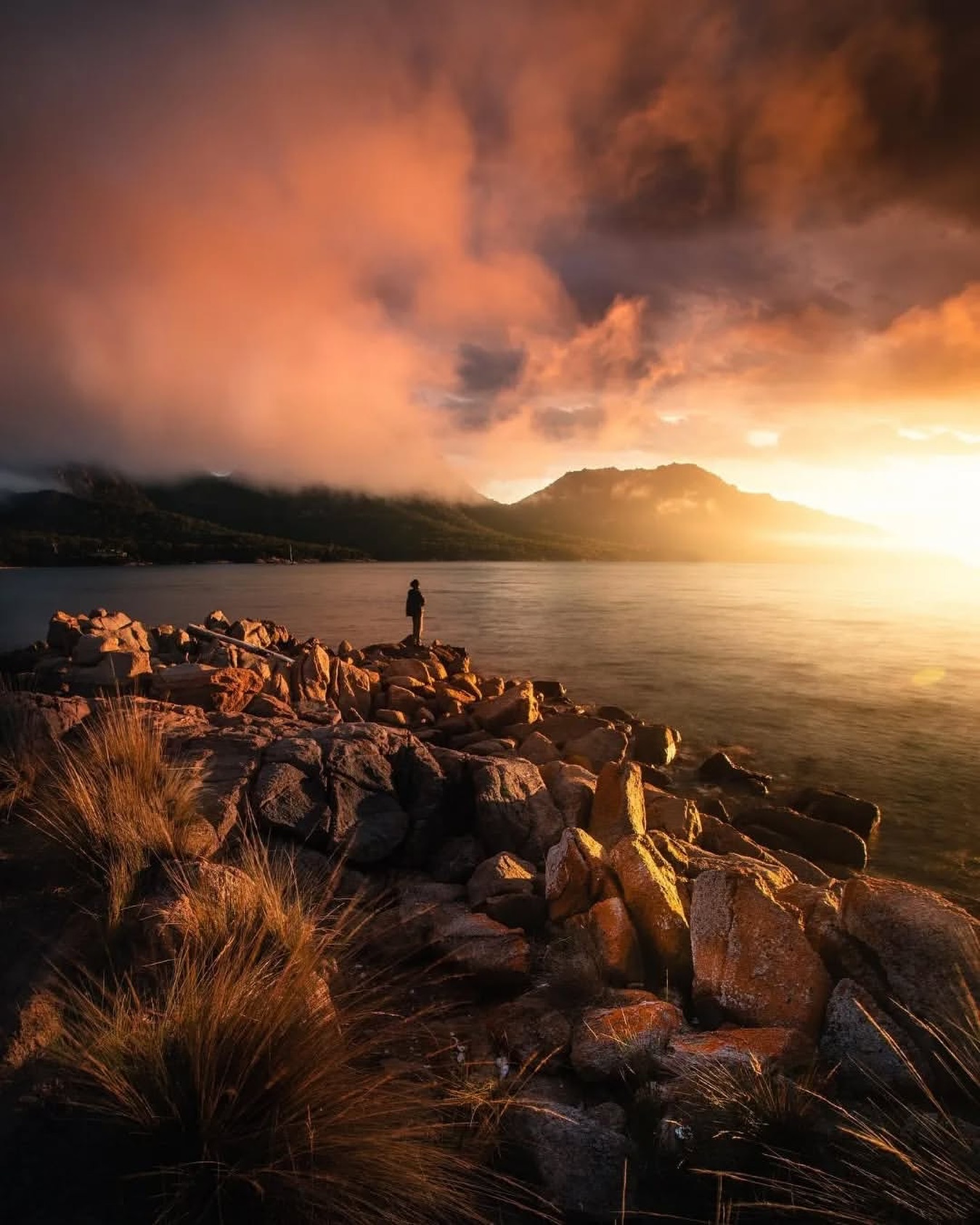 The Hazards glowing above Coles Bay at sunset in Freycinet National Park