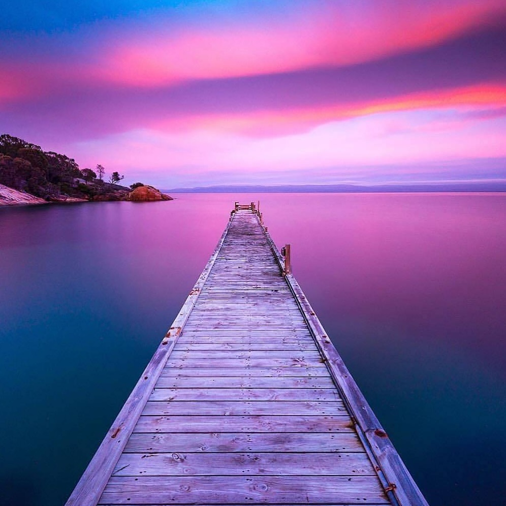 Pastel sunrise over Richardsons Beach in Freycinet National Park